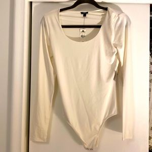 Express white body contour bodysuit. Never worn, tags still on.